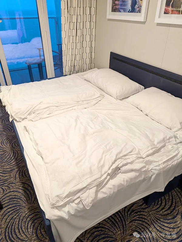 The king bed by the balcony door