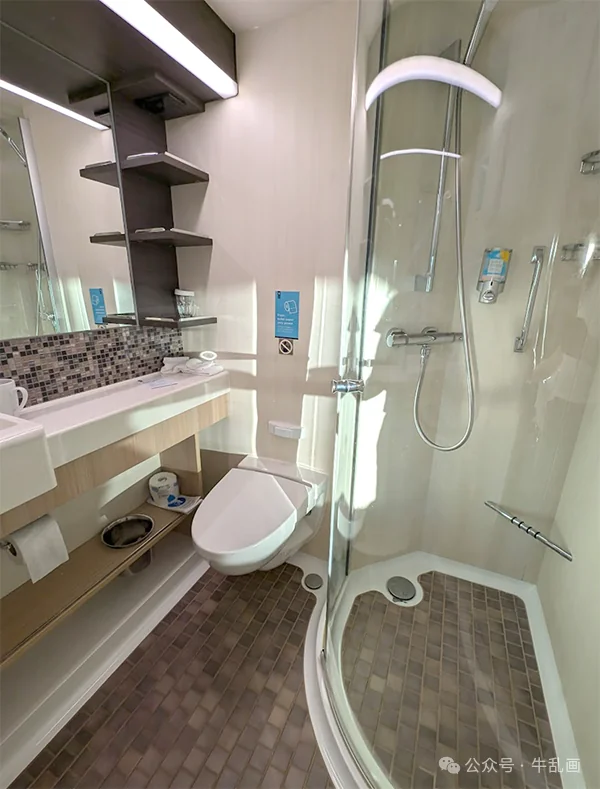 The compact cabin bathroom with corner shower