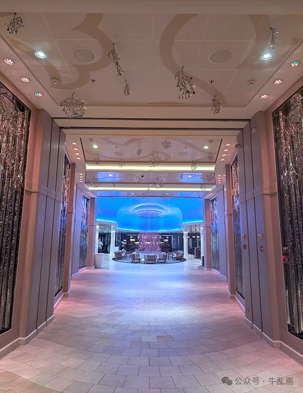 Elegant corridor leading to a glowing lounge