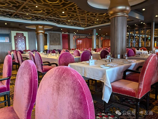 Pink velvet chairs in the Silk main dining room