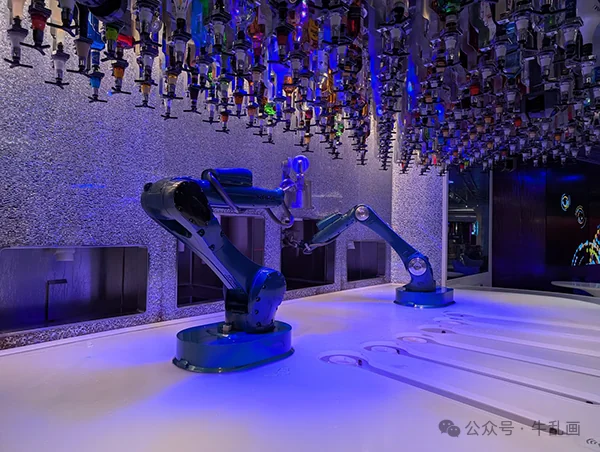 The robotic bartenders at the Bionic Bar under a ceiling of bottles