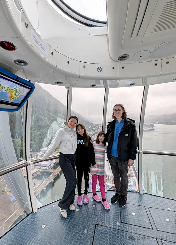 The family inside the North Star pod high above Juneau
