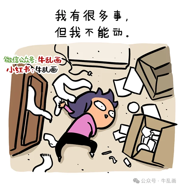 Niu-ma lies flat on the floor surrounded by moving boxes and clutter